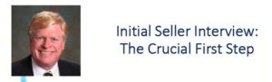 A blue and white logo for initial selling the crucible.