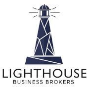 A blue and white logo of a lighthouse.
