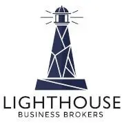 A blue and white logo of a lighthouse.